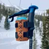 Leather ski pole beer holder